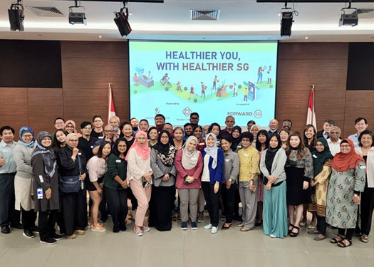 SPS Rahayu with participants from various community groups in an engagement session discussing Healthier SG.