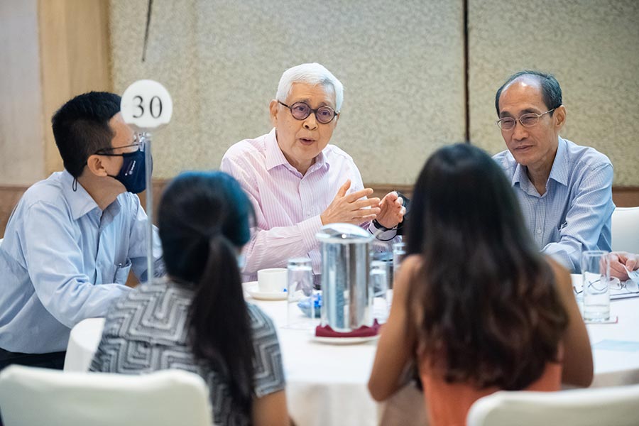 A participant sharing his views on tackling climate change in Singapore during the table discussions at the event. Credit: MCI / Syafiq