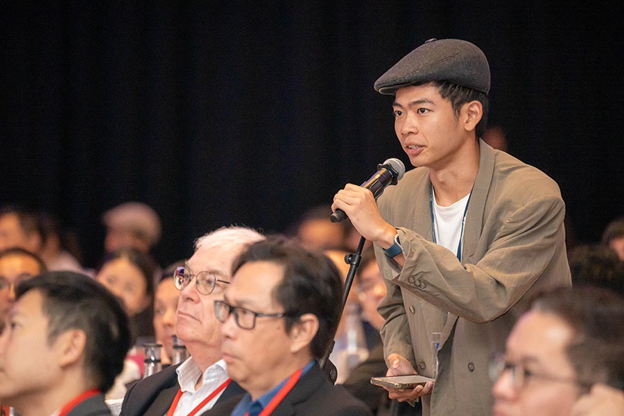 A member of the audience participating during the Q&A segment of the panel discussion. (Photo by: MCI / Amos Poh)