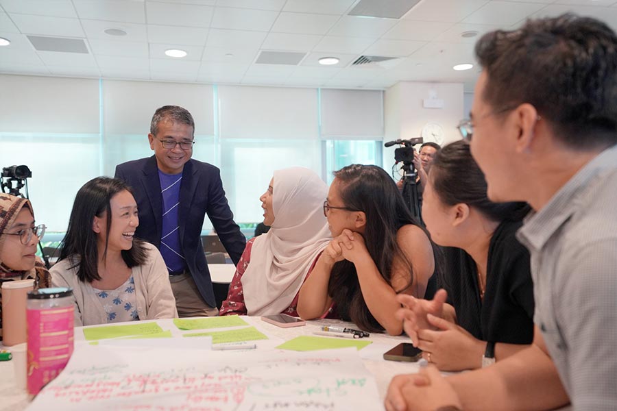 Minister Edwin Tong speaking to youth leaders at the event. Credit: MCI / Dingwei Tan