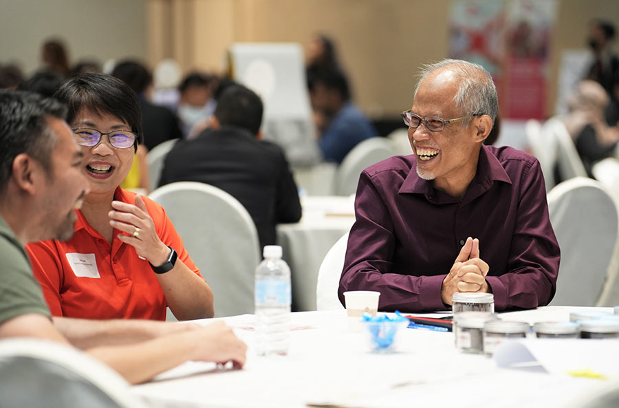 Minister Masagos speaking to social service workers and volunteers at the SG Cares Community Network Session and ComLink Alliance Meeting (Ang Mo Kio/Yishun) on 20 October 2022. (Credit: MCI / Ding Wei) 