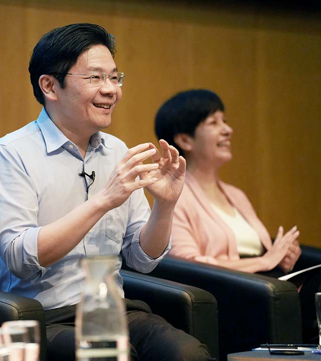 DPM Lawrence Wong, Minister Indranee Rajah and MOS Sun Xueling speaking to social service practitioners during the dialogue session on 10 October 2022. (Credit: MCI / Ding Wei)