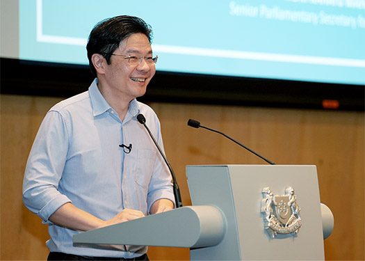 DPM Lawrence Wong addressing social service practitioners at the Forward Singapore Conversation.