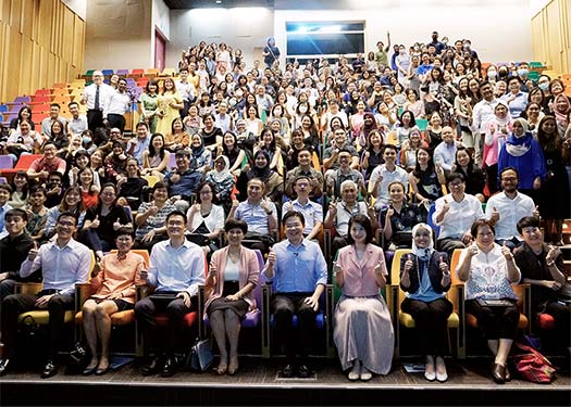 DPM Wong, Minister Indranee, MOS Sun Xueling, and SPS Rahayu engaging social service practitioners in a dialogue.