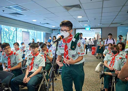 Scouts took turns to ask questions on environmental sustainability during the dialogue with Minister Grace Fu.