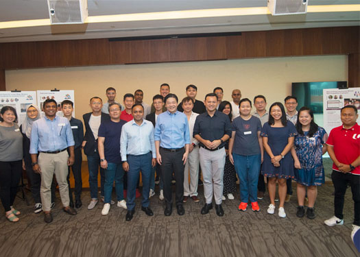 DPM Lawrence Wong and SMS Zaqy Mohamad with participants at the Alliance for Action for Lower-Wage Workers workshop.