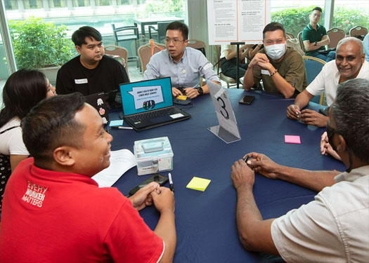 Participants at the Alliance for Action  for Lower-wage Workers workshop exchanging ideas.