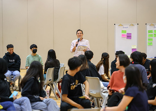 SMS Tan Kiat How speaking with students on the importance of providing an opportunity for every Singaporean to succeed.