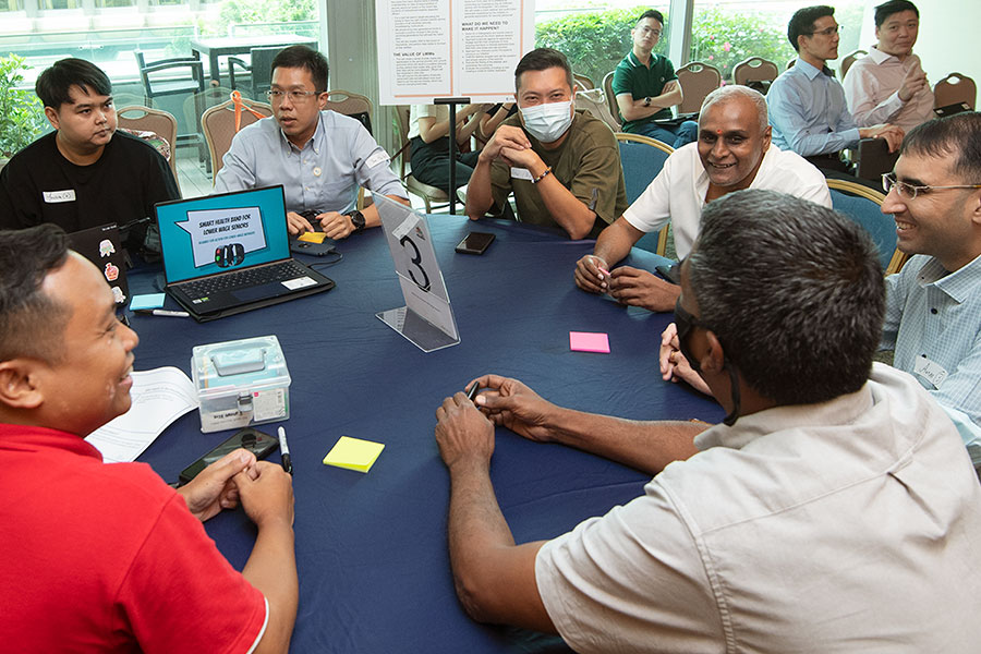 Participants at the Alliance for Action for Lower-wage Workers workshop exchanging ideas.