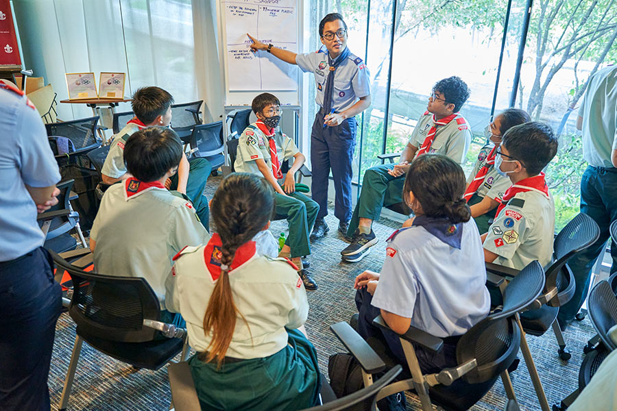 Participants from the Singapore Scout Association brainstormed on how they can do their part for the environment. (Credit: MCI / Kevin)